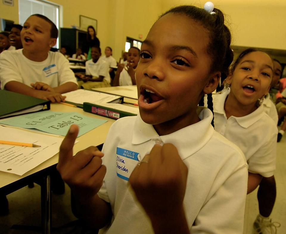 Fifth grader Olivia Sheridan and her classmates loudly sing numbers during an intense program under the leadership of KIPP Academy-Charlotte founder and principal Keith Burnam in this 2007 file photo. KIPP has been approved to offer a teacher training program in North Carolina. Charlotte Observer file photo