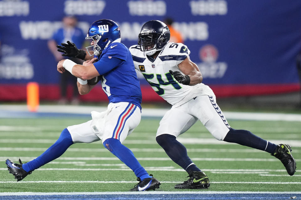 New York Giants quarterback Daniel Jones (8) is sacked by Seattle Seahawks linebacker Bobby Wagner (54) during the fourth quarter of an NFL football game, Monday, Oct. 2, 2023, in East Rutherford, N.J. (AP Photo/Frank Franklin II)