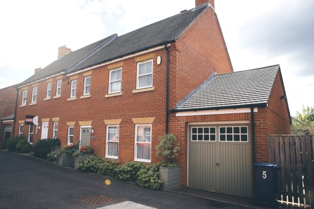 House with Sold Sign