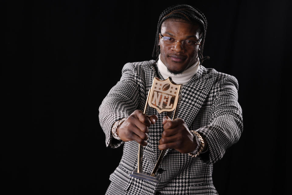 Baltimore Ravens' Lamar Jackson, AP Most valuable player, poses after winning the award at the NFL Honors award show ahead of the Super Bowl 58 football game Thursday, Feb. 8, 2024, in Las Vegas. The San Francisco 49ers face the Kansas City Chiefs in Super Bowl 58 on Sunday. (AP Photo/Matt York)