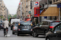 Drivers form a queue as they wait at a gas station due to blockades of several oil depots by protesters opposed to the governments proposed labor law reforms in Paris, France, May 26, 2016. REUTERS/Benoit Tessier