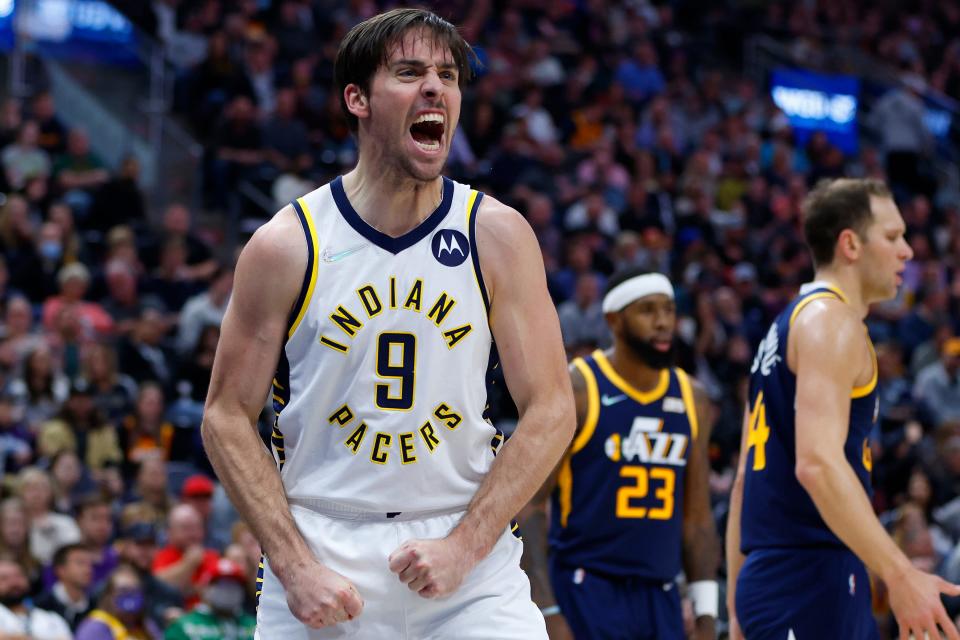 Nov 11, 2021; Salt Lake City, Utah, USA; Indiana Pacers guard T.J. McConnell (9) reacts after his basket right before the buzzer to end the second quarter against the Utah Jazz at Vivint Arena. Mandatory Credit: Jeffrey Swinger-USA TODAY Sports