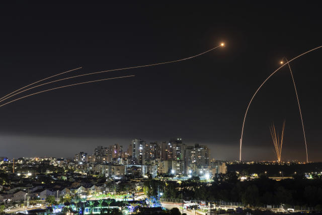 Israel's Iron Dome missile defense system fires interceptors at rockets launched from the Gaza Strip, in Ashkelon, southern Israel. Thursday, May 11, 2023. (AP Photo/Tsafrir Abayov)