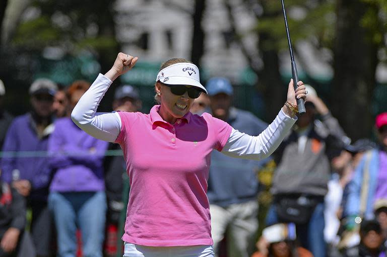 Morgan Pressel of the US celebrates an eagle putt on the sixth hole during the final round of the Swinging Skirts LPGA Classic, at the Lake Merced Golf Club in Daly City, California, on April 26, 2015