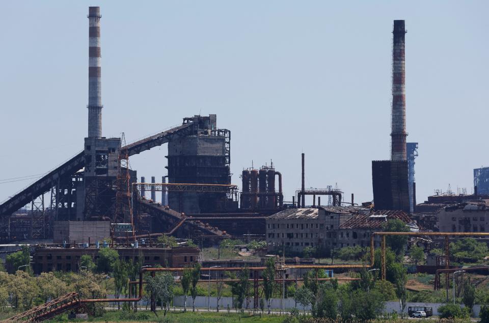 Two of the spires at the Azovstal steel plant can be seen in Mariupol (REUTERS)