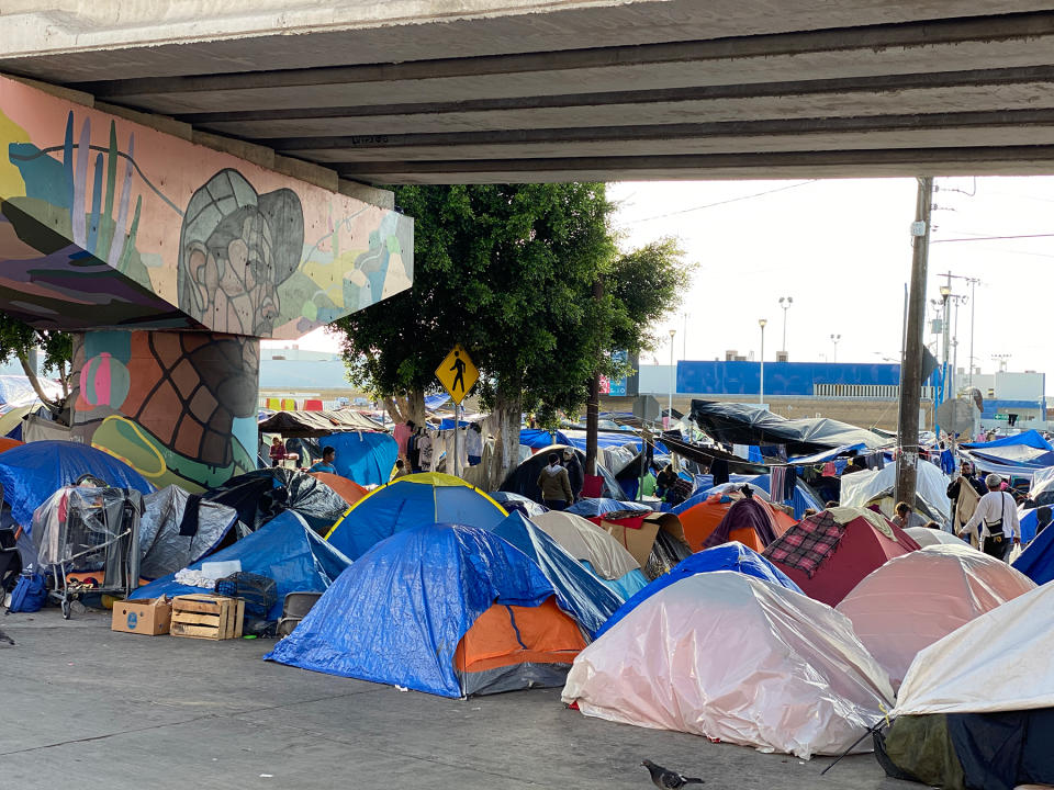 An encampment near the U.S.-Mexico border. There have been more than 10,000 violent attacks on migrants living at the border since the Trump anti-immigration policies were enacted. - Credit: Eli Cahan