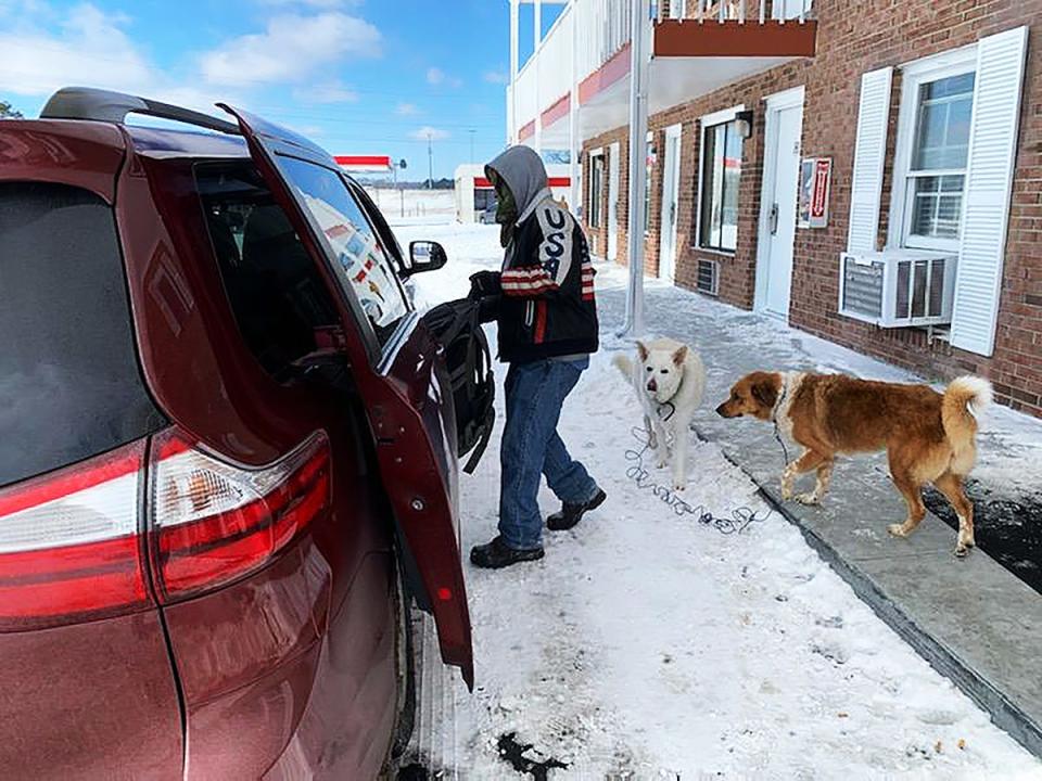 The Salvation Army picked up 24 homeless individuals and three dogs at 11 a.m. at Rodeway Inn and transported them to the emergency warming shelter at the Carl Perkins Civic Center on Tuesday, Feb 17, 2021, in Jackson, Tenn.