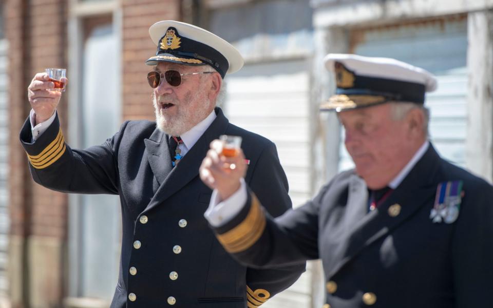  Sir Robin Knox-Johnston and Vice Admiral John McAnally have a tot of rum to commemorate Operation Dynamo  - Paul Grover/The Telegraph