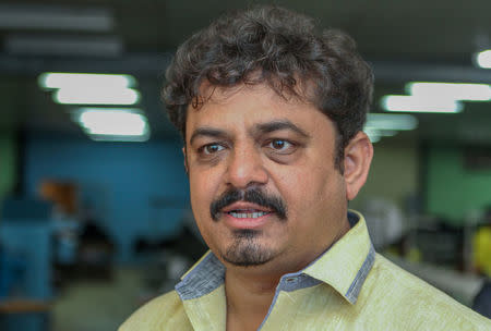 Ritesh Patel, Managing Director of the Utexrwa garment factory speaks during a Reuters interview in Kigali, Rwanda April 17, 2018. Picture taken April 17, 2018. REUTERS/Jean Bizimana