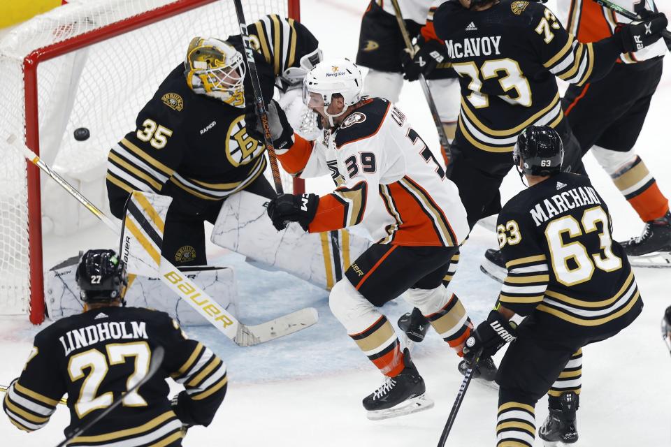 Anaheim Ducks' Sam Carrick (39) celebrates after the tying goal by Troy Terry against Boston Bruins' Linus Ullmark (35) during the third period of an NHL hockey game, Thursday, Oct. 26, 2023, in Boston. (AP Photo/Michael Dwyer)