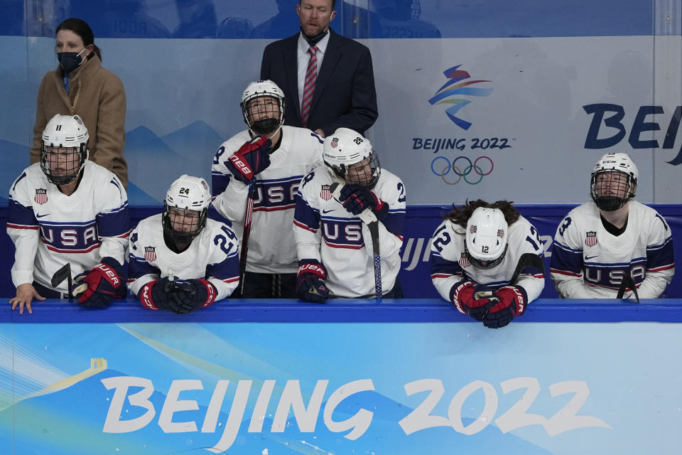 United States reacts after losing to Canada in the women's gold medal hockey game at the 2022 Winter Olympics, Thursday, Feb. 17, 2022, in Beijing. (AP Photo/Jae C. Hong)