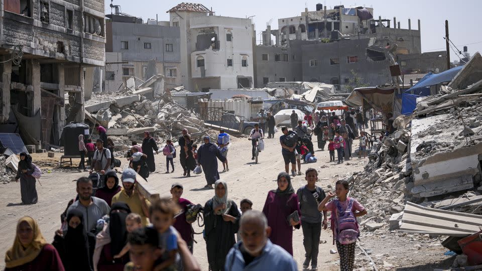 Streams of Palestinians were displaced by Israel's renewed assault on parts of Khan Younis, in southern Gaza, on Monday, following an evacuation order by the Israeli military. - Abdel Kareem Hana/AP