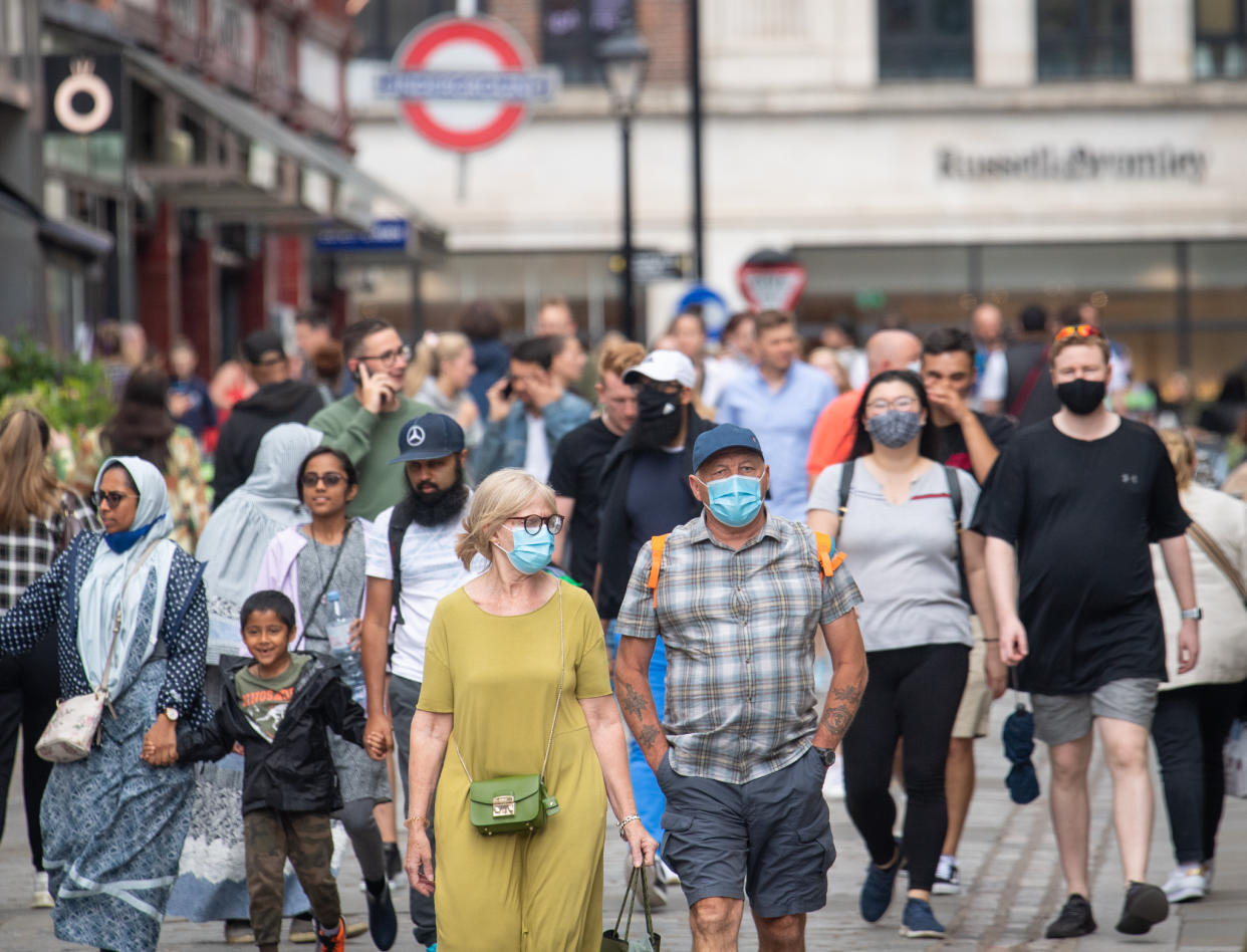 People wearing face masks among crowds of pedestrians in Covent Garden, London. Rumours were abound in the Sunday newspapers that Prime Minister Boris Johnson, who is due to update the nation this week on plans for unlocking, is due to scrap social distancing and mask-wearing requirements on so-called 