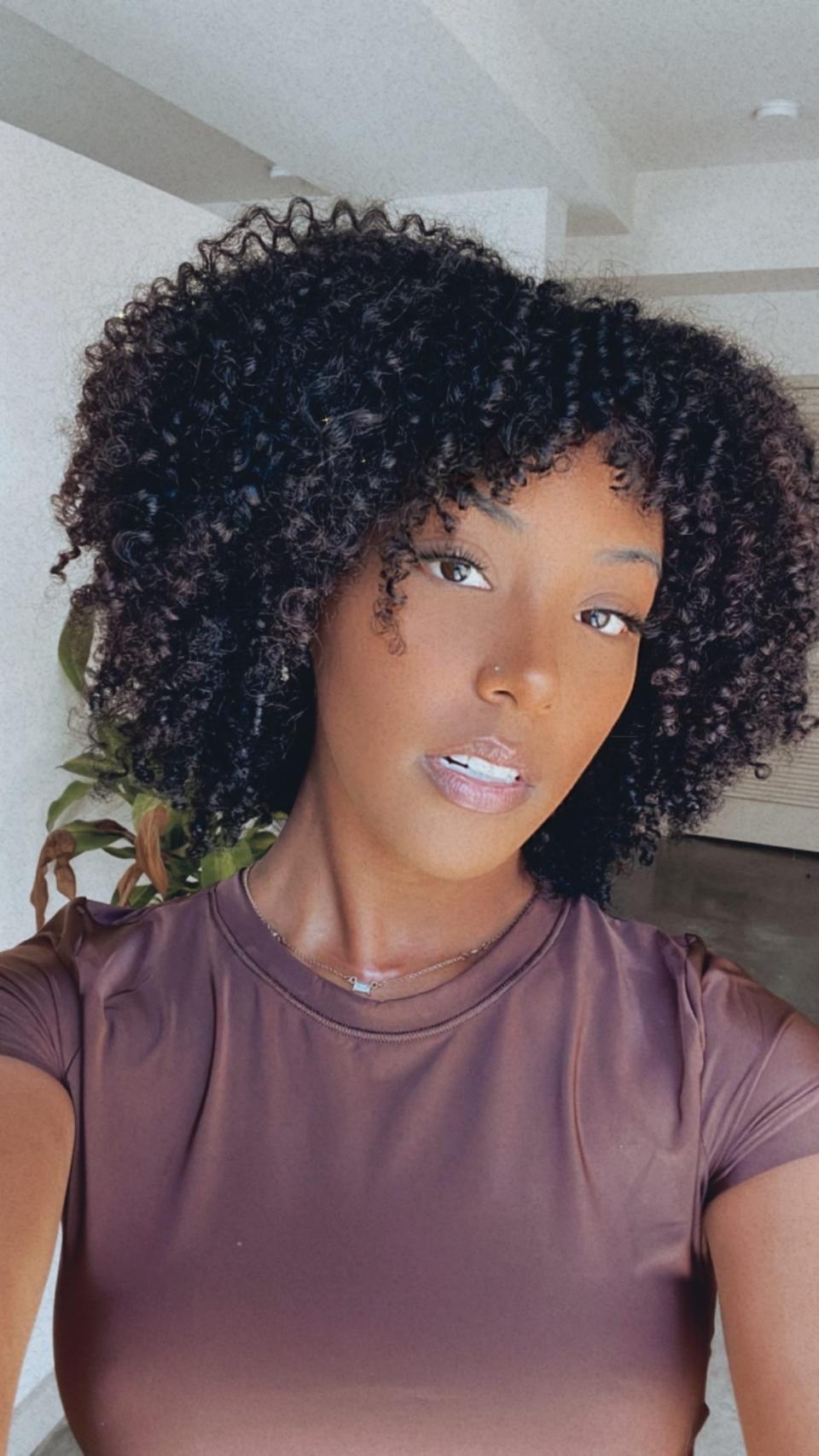 Alexis Davis today is a content creator who has fully embraced her natural curls.