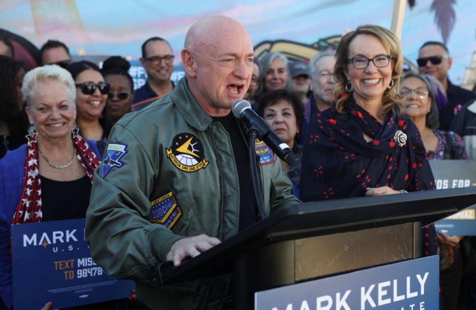 U.S. Senator Mark Kelly (D-AZ) and his wife Gabby Giffords, in Phoenix, Arizona, U.S., November 12, 2022.