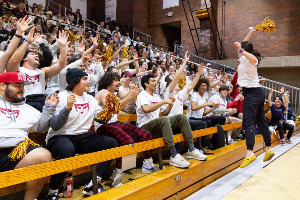 The Willamette student section cheers their team during the NWC semifinal game at Cone Field House on Friday, Feb. 23, 2024, in Salem, Ore.