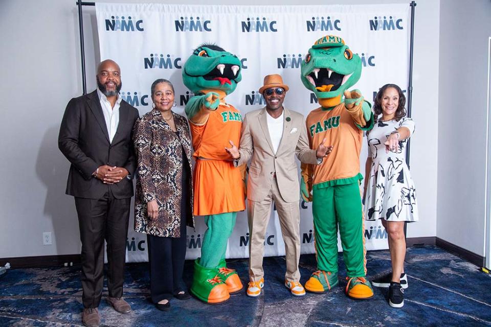 At the NAMIC Conference (from l.): Trymaine Lee, MSNBC correspondent and host of the ‘Into America’ podcast; Shuanise Washington, president and CEO NAMIC; FAMU mascot “Mrs. Venom;” Will Packer, president and CEO, Will Packer Productionsl; FAMU mascot “Mr. Venom;” and Emory Walton, VP, content distribution, A+E Networks.