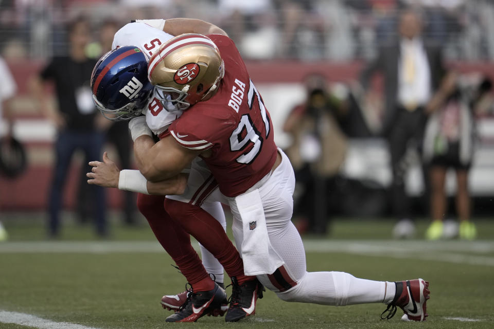 San Francisco 49ers defensive end Nick Bosa (97) sacks New York Giants quarterback Daniel Jones during the first half of an NFL football game in Santa Clara, Calif., Thursday, Sept. 21, 2023. (AP Photo/Godofredo A. Vásquez)