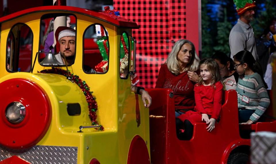 Children enjoyed a meal, songs, and rides on a small train at the 38th annual Flight to the North Pole program for children with disabilities and terminal illnesses at Feld Entertainment in Palmetto.