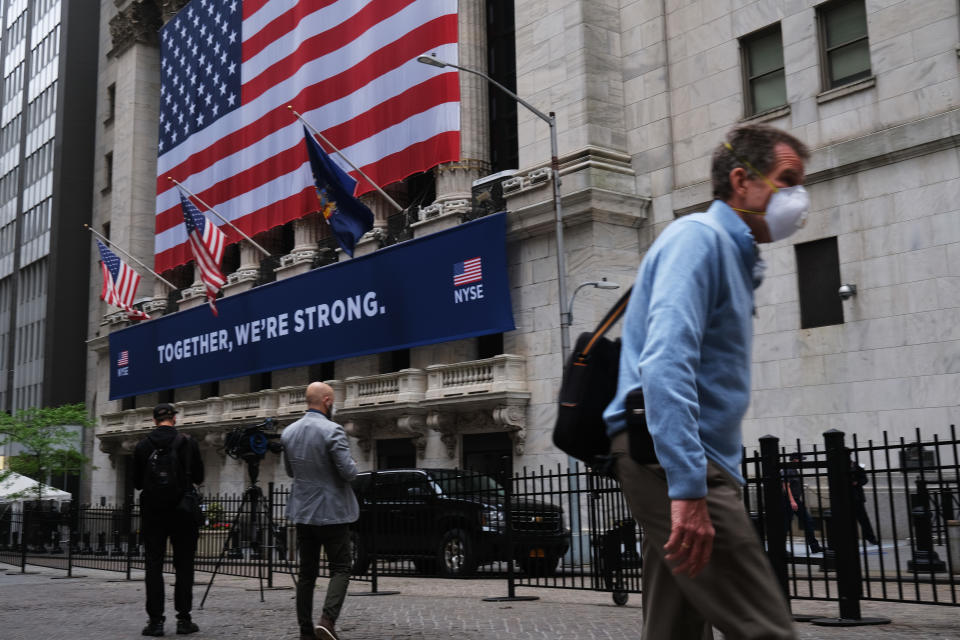 NEW YORK, NEW YORK - MAY 26: The New York Stock Exchange (NYSE) stands in lower Manhattan on the first day that traders are allowed back onto the historic floor of the exchange on May 26, 2020 in New York City. While only a small number of traders will be returning at this time, those that do will have to take temperature checks and wear face masks at all times while on the floor. The Dow rose over 600 points in morning trading as investors see economic activity in America picking up (Photo by Spencer Platt/Getty Images)