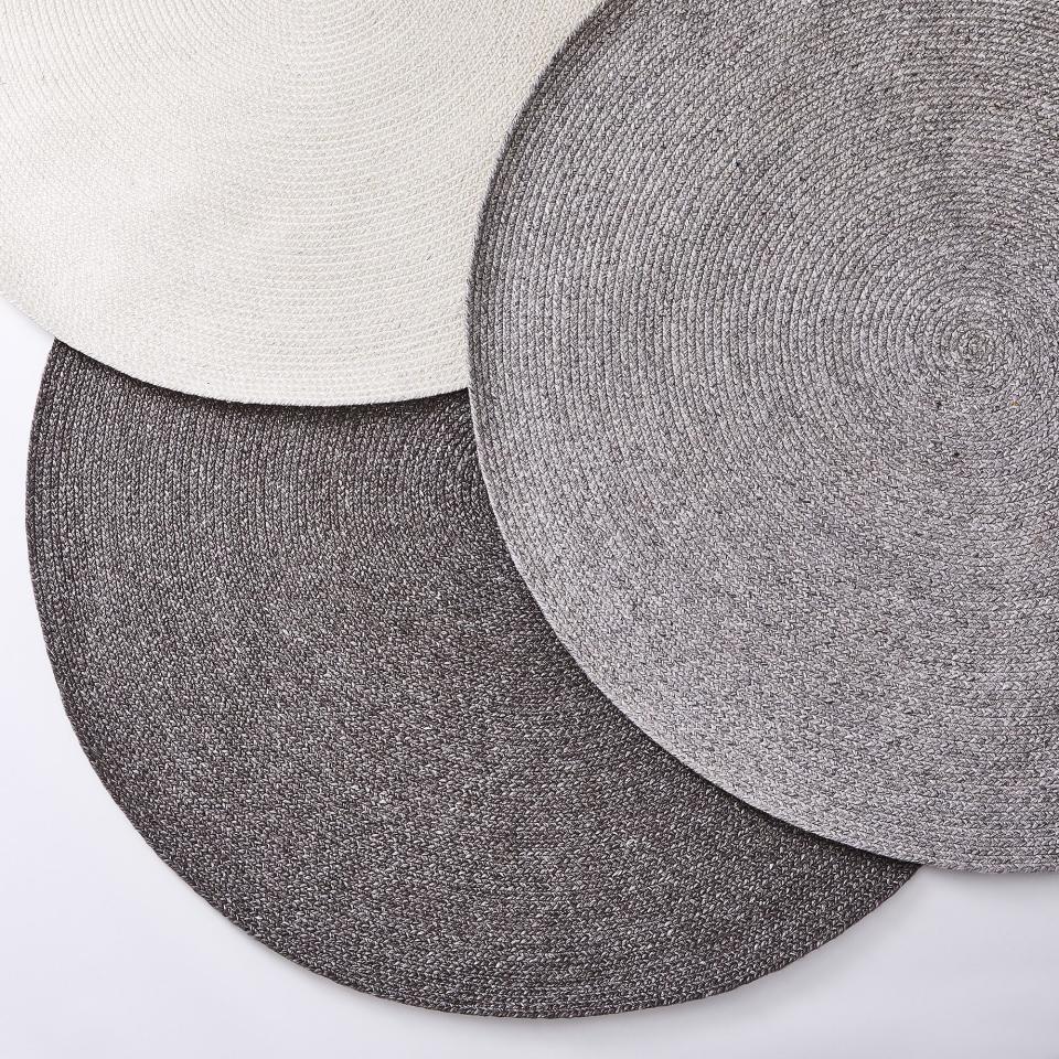 11) Hand-Braided Round Wool Rug