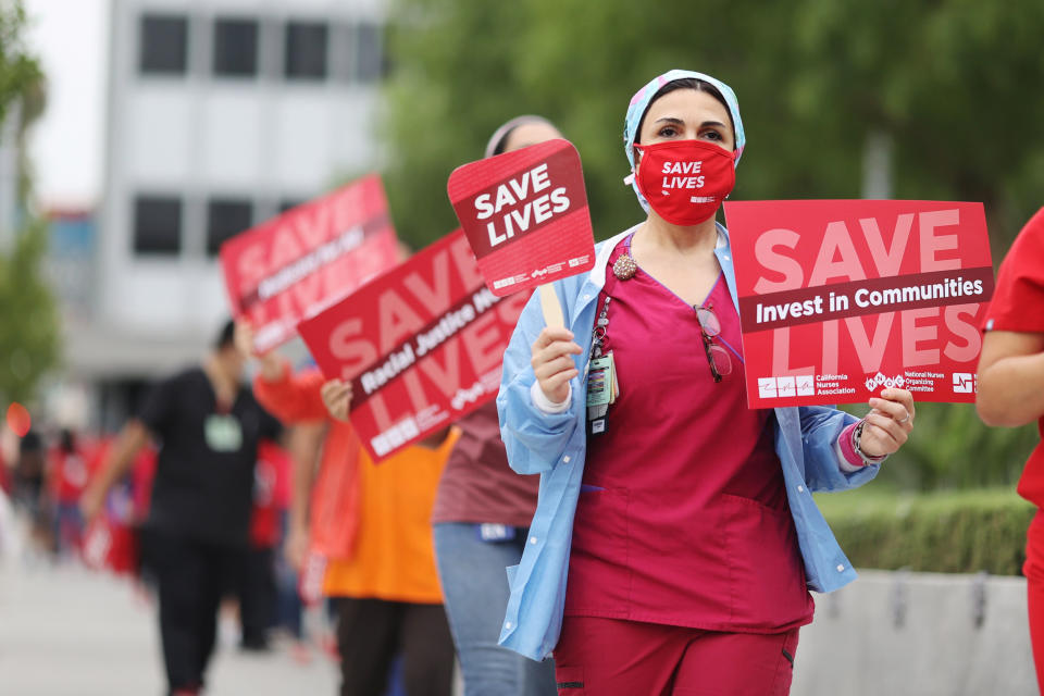 Nurses protest for PPE and safer working practices in Los Angeles on Aug. 5, 2020. (Lucy Nicholson / Reuters file)