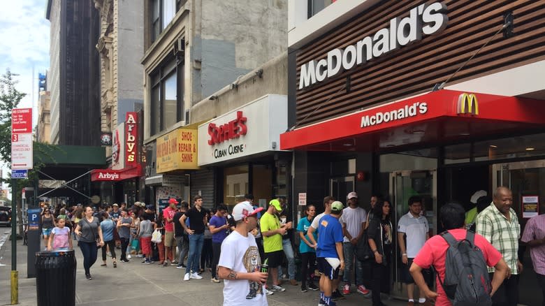 Crowd waiting outside McDonald's