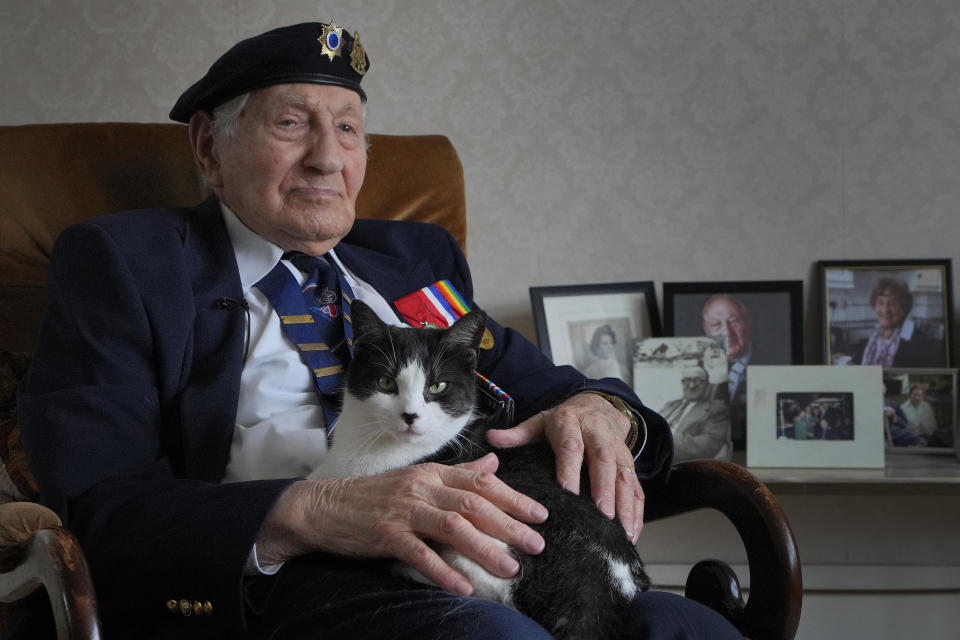 Mervyn Kersh D-Day veteran who fought in the Normandy Campaign, with his cat Joey at his home in London, Monday, April 8, 2024. A Jewish veteran is preparing to commemorate the 80th anniversary of the D-Day landings. Pvt. Mervyn Kersh was summoned by his commanding officer and threatened with arrest even as he prepared to embark for the battlefields of Normandy eight decades ago. (AP Photo/Kirsty Wigglesworth)