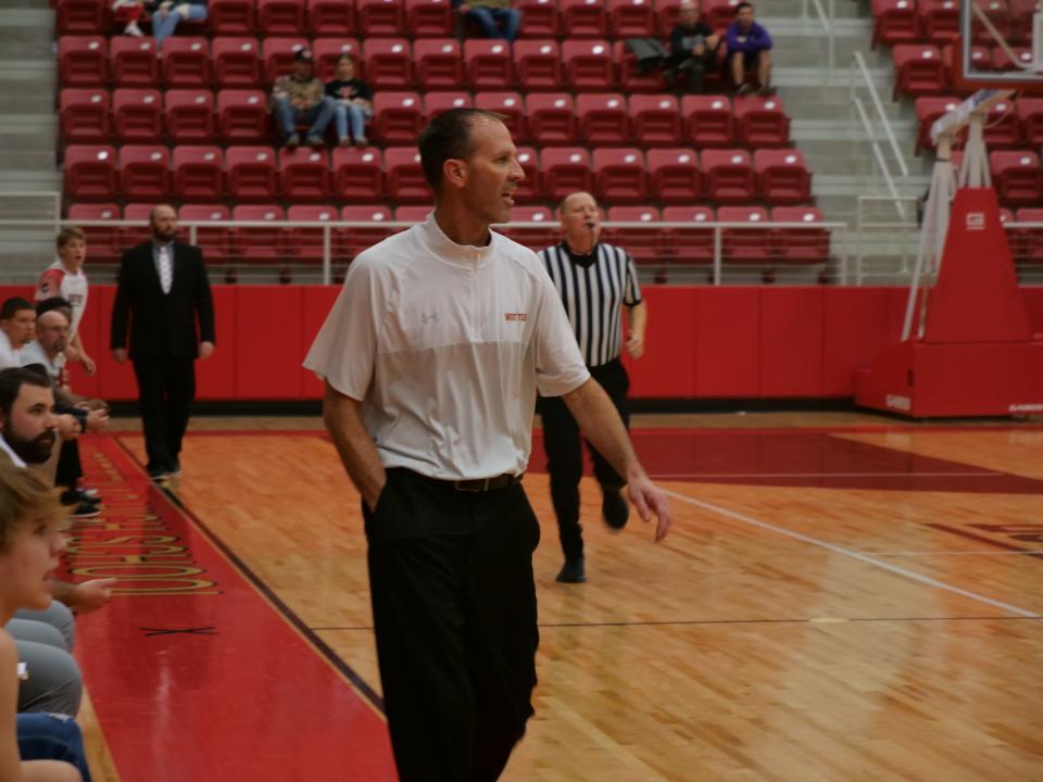 West Texas Stinnett coach Aron Graves roams the sideline during a game against Gruver on Friday, February 10, 2023 at the Stinnett Events Center.