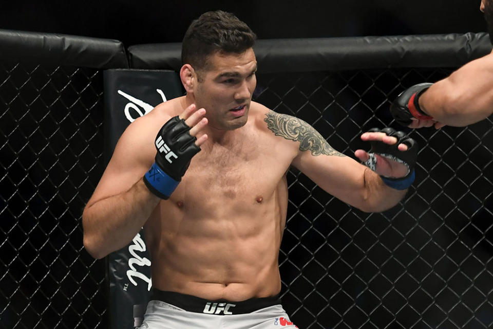 Oct 18, 2019; Boston, MA, USA; Dominick Reyes (red) fights Chris Weidman (blue) in a light heavyweight bout during UFC Fight Night at the TD Garden. Mandatory Credit: Bob DeChiara-USA TODAY Sports