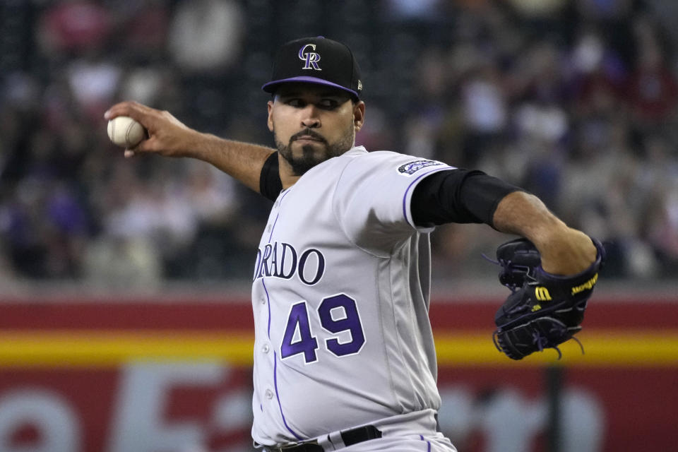 Colorado Rockies pitcher Antonio Senzatela throws against the Arizona Diamondbacks in the first inning during a baseball game, Saturday, Aug. 6, 2022, in Phoenix. (AP Photo/Rick Scuteri)