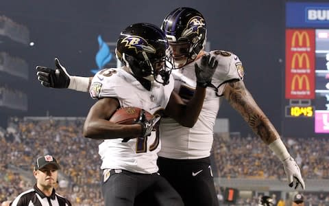 Baltimore Ravens wide receiver John Brown (13) celebrates his touchdown catch with tight end Maxx Williams (87) against the Pittsburgh Steelers - Credit: (Charles LeClaire/USA Today)