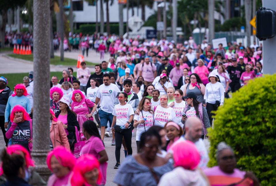 Thousands of participants walk northbound along South Flagler Drive during the 2023 Susan G. Komen More Than Pink Walk.