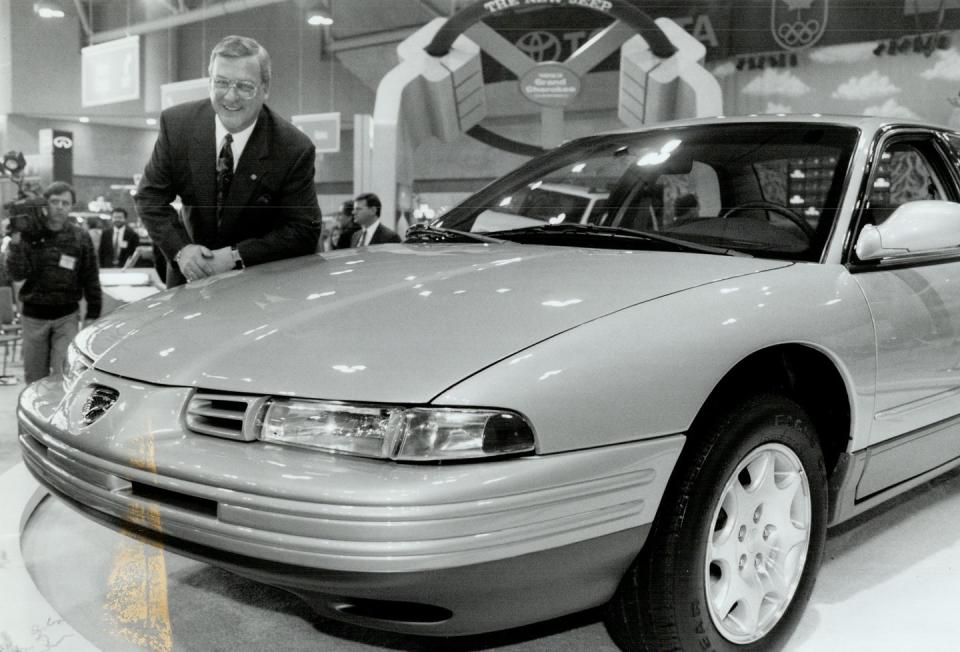 driving ambition chrysler canada president yves landry proudly shows off at the toronto auto show o