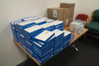 COVID-19 self-test kits, at Great Academy Ashton, as the school prepares for its reopening on March 8 after the latest lockdown curb the spread of coronavirus, in Ashton-Under-Lyne, England, Thursday, March 4, 2021. The school for approximately 1300 pupils aged 11 to 16 in Greater Manchester will have to conduct around 450 tests per day on pupils and staff in the first 2 weeks after the return of students on Monday. (AP Photo Jon Super)