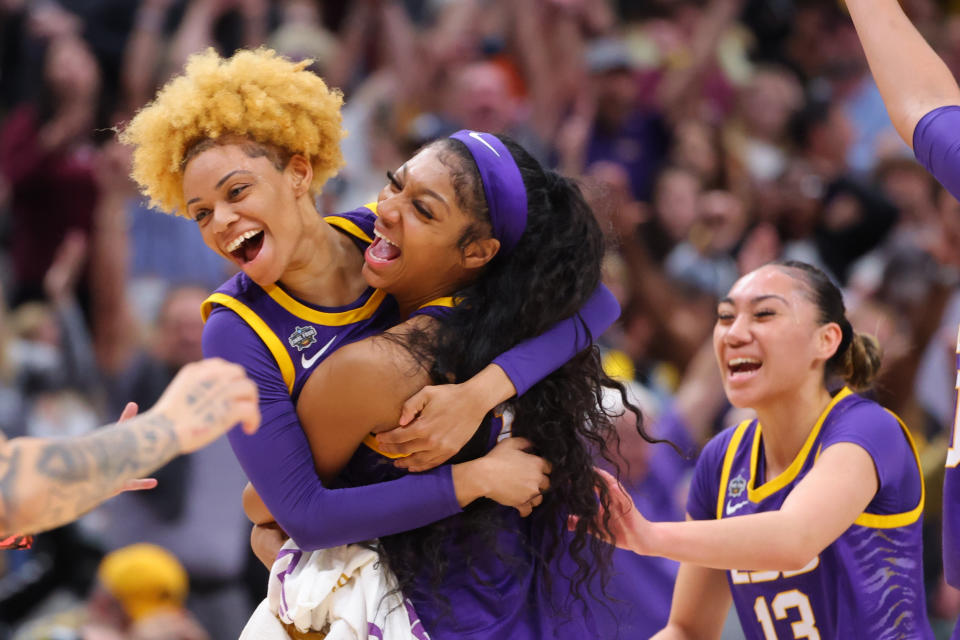 LSU&#39;s Jasmine Carson and Angel Reese celebrate during the NCAA women&#39;s tournament national championship game at American Airlines Center in Dallas on April 2, 2023. (C. Morgan Engel/NCAA Photos via Getty Images)