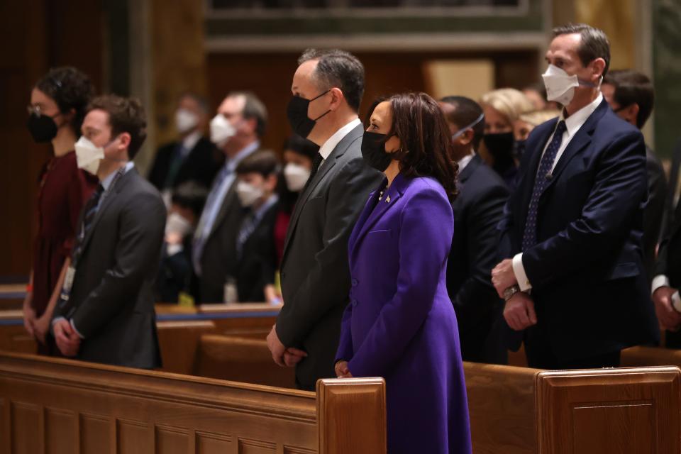 Vice President-elect Kamala Harris (R) and her husband Doug Emhoff (L) attend services at the Cathedral of St. Matthew the Apostle on Jan. 20, 2021 in Washington, DC.