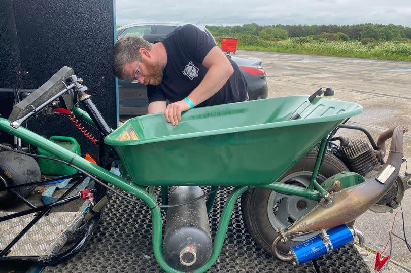 Dylan gets to work on the barrow just before breaking the record at Straightliners Speed Week -Credit:Dylan Phillips