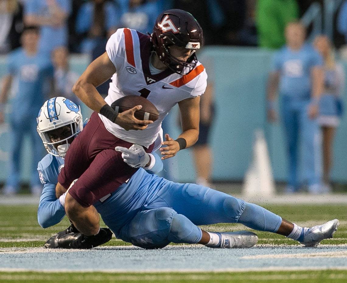 North Carolina’s Randy Caldwell (44) sacks Virginia Tech quarterback Jason Brown (1) in the fourth quarter on Saturday, October 1, 2022 at Kenan Stadium in Chapel Hill, N.C.