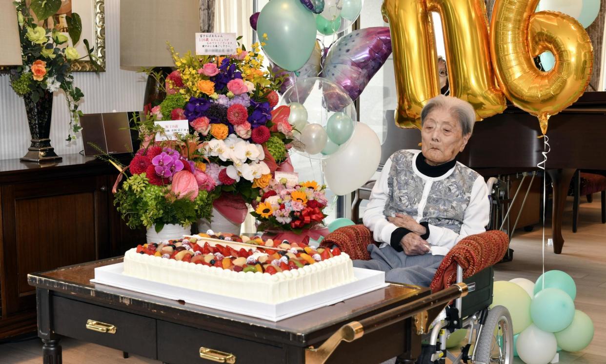 <span>Tomiko Itooka pictured celebrating her 116th birthday in Ashiya, Hyogo prefecture, Japan, in May.</span><span>Photograph: Ashiya City Handout/EPA</span>