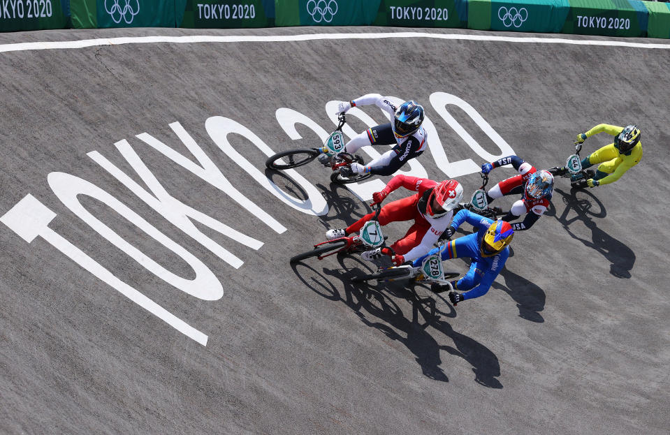 <p>TOKYO, JAPAN - JULY 29: (L-R) Alfredo Campo of Team Ecuador, David Graf of Team Switzerland, Carlos Alberto Ramirez Yepes of Team Colombia, Connor Fields of Team United States and Anthony Dean of Team Australia as they compete during the Men's BMX quarterfinal heat 4, run 2 on day six of the Tokyo 2020 Olympic Games at Ariake Urban Sports Park on July 29, 2021 in Tokyo, Japan. (Photo by Laurence Griffiths/2021 Getty Images)</p> 