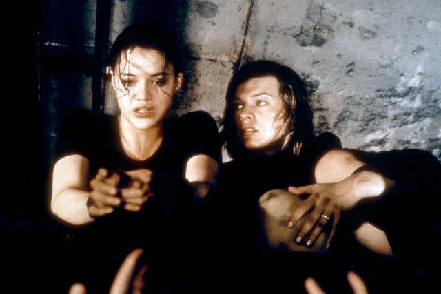 <p>Columbia/Everett</p> Michelle Rodriguez and Milla Jovovich in 'Resident Evil'