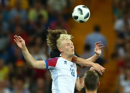 Soccer Football - World Cup - Group D - Iceland vs Croatia - Rostov Arena, Rostov-on-Don, Russia - June 26, 2018 Croatia's Tin Jedvaj in action with Iceland's Hordur Magnusson REUTERS/Hannah McKay