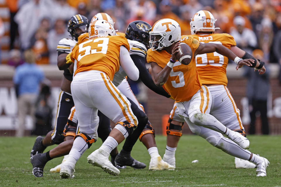 Tennessee quarterback Hendon Hooker (5) throws to a receiver during the first half of an NCAA college football game against Missouri Saturday, Nov. 12, 2022, in Knoxville, Tenn. (AP Photo/Wade Payne)