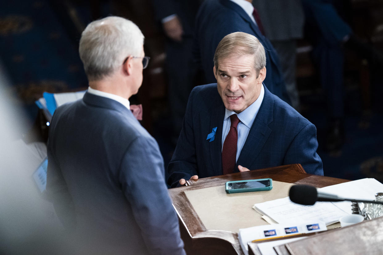 Washington, DC - October 18 : Rep. Jim Jordan, R-Ohio, Republican nominee for speaker of the House, speaks to Speaker Pro Tempore Rep. Patrick McHenry (R-NC) at the start of the second ballot vote as Republicans attempt to earn more than 218 votes for a new Speaker of the House on Capitol Hill on Wednesday, Oct. 18, 2023, in Washington, DC. (Photo by Jabin Botsford/The Washington Post via Getty Images)