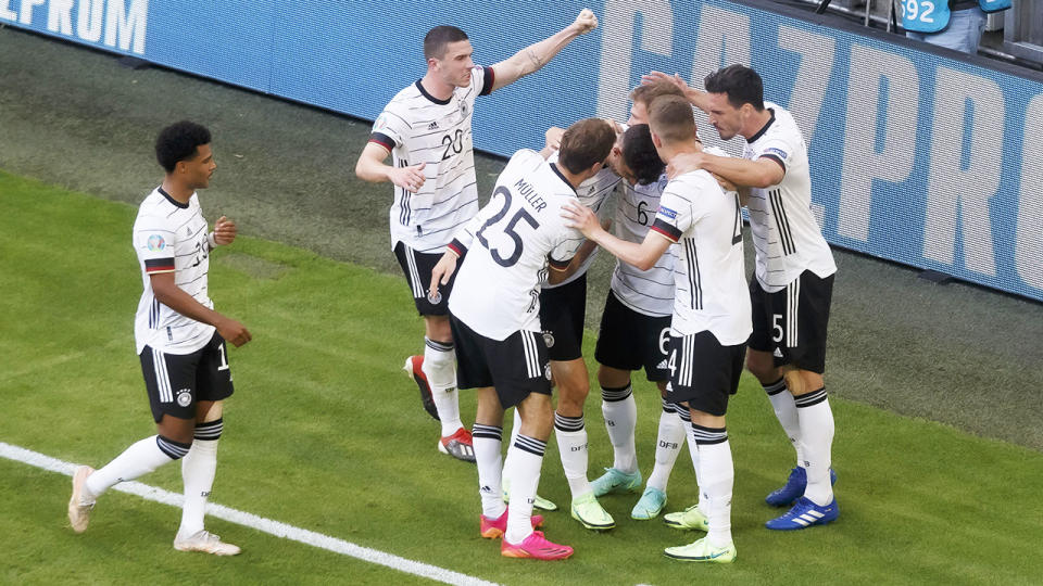 German players, pictured here celebrating after their second goal against Portugal.