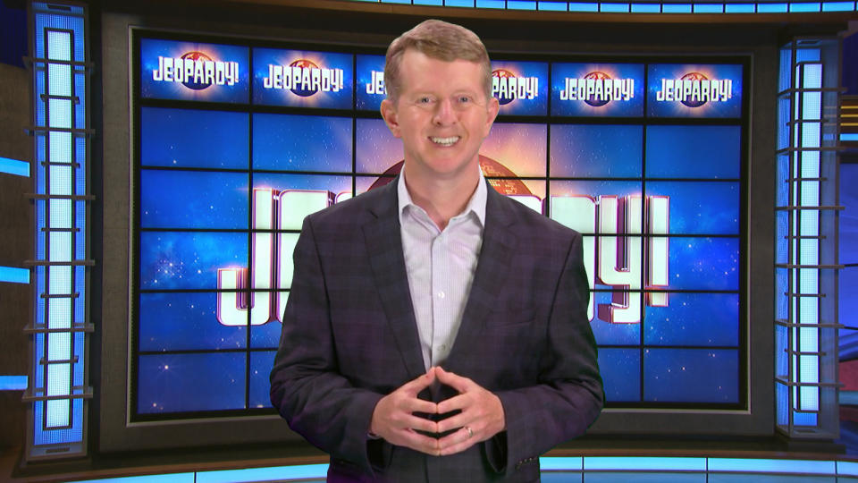 This image released by JEOPARDY! shows Ken Jennings, a 74-time champion the the set of the popular quiz show. Jennings will serve as a consulting producer on season 37, which premieres on Sept. 14. (JEOPARDY! via AP)