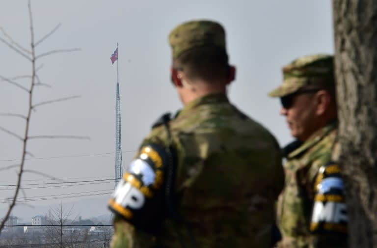 US soldiers stand guard at Taesungdong Elementary School in South Korea on February 4, 2016