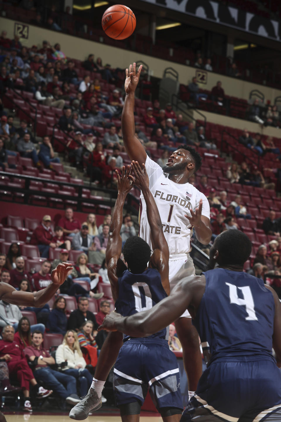 Florida State forward RaiQuan Gray (1) shoots as North Florida guard Emmanuel Adedoyin (0) defends in the second half of an NCAA college basketball game in Tallahassee, Fla., Tuesday, Dec. 17, 2019. Florida State won 98-81. (AP Photo/Phil Sears)