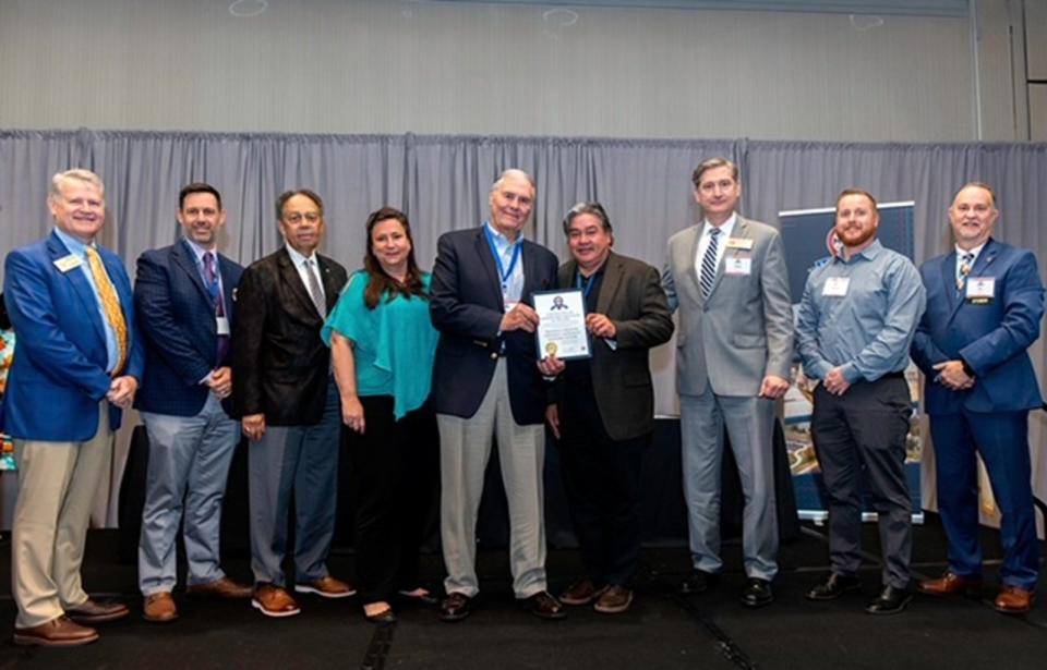 The Davidson County Airport has been awarded the 2022 Mobi Award for most voted project and received Honorable Mention in the Small Urban category at the Mobi Awards ceremony. Pictured are Michael Fox, chairman of the NC Board of Transportation; Matt Jones, NCDOT Division 9 deputy traffic engineer; Andrew Perkins, vice chairman of the NC Board of Transportation; Rachel Bingham, NCDOT Division of Aviation deputy director/manager of aviation development; Rick Phillips, chairman of the Davidson County Airport; Karel Van Der Linden, Davidson County Airport manager;  Bobby Walston, NCDOT Division of Aviation director; Michael Player, project engineer, for Talbert, Bright & Ellington;  and J . Eric Boyette, NCDOT Secretary of Transportation.